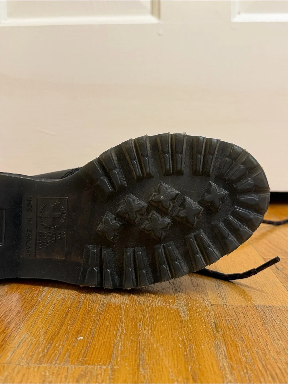Dr. Martens Black Leather Hiking-Style Boots with Yellow Stitching